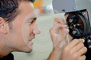 close up watchmaker at work
