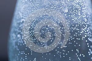 Close up of water bubbles in a clear glass