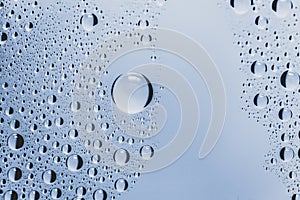 Close up of water drops on dark background