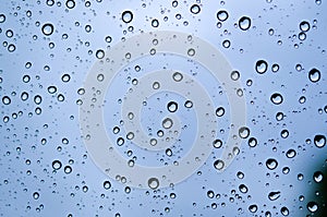 Close-up of water drops on glass surface