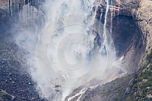 Close up of water flowing from Upper Yosemite Falls smashing on the rock walls, Yosemite National Park, California