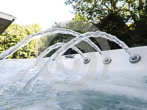 Close-up of water jets inside hot tub