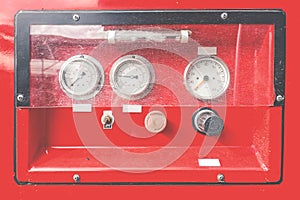 Closeup Water pressure gauge of a vintage firebrigade car photo