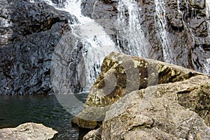 Close up of waterfall around stones