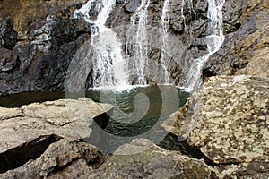 Close up of waterfall around stones