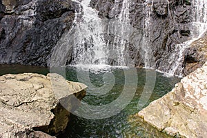 Close up of waterfall around stones at Khao Yai National Park