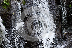 Close up of waterfall. Dynamic water flow. Waterscape background. Nature and environment concept. Pucak Manik waterfall Bali,