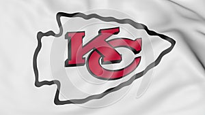 Close-up of waving flag with Kansas City Chiefs NFL American football team logo, 3D rendering