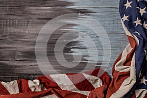 Close up of waving national usa american flag on wooden background