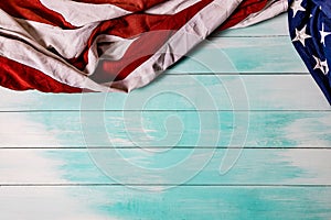 Close up of waving national usa american flag on wooden background