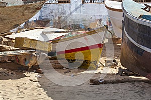 Close up of weathered boats parked on the beach of Sal Rei on Boa Vista