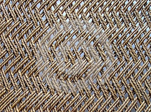 Close up of webbed wooden cot, India. Background. Texture