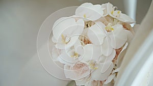 Close up of wedding bouquet with delicate pink flowers. Elegant beautiful bridal posy. Wedding symbol. Detail view on
