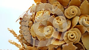 Close-up, wedding loaf, cake, bread, decorated with various colors of dough, roses, dough leaves. wedding traditions