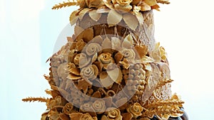 close-up, wedding loaf, cake, bread, decorated with various colors of dough, roses, dough leaves. wedding traditions