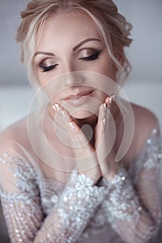 Close-up wedding portrait of beautiful bride woman with make-up