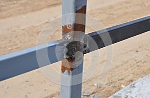 Close up Weld on a Steel Iron Bar for a New Fence Frame.