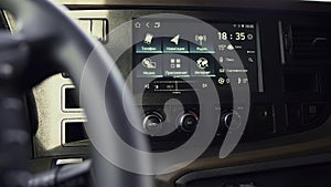 Close up of wheel and dashboard of a truck machine. Scene. View inside of a truck car interior.