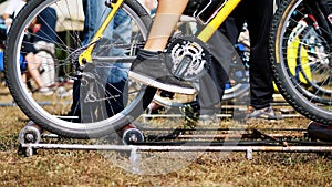 close-up, the wheels of an old exercise bike, the bike rides in one place with the help of a special self-made fixture