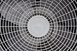 Close up of white air conditioner grille. Electronics industry a