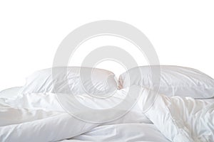 Close up white bedding sheets and pillow isolated on white