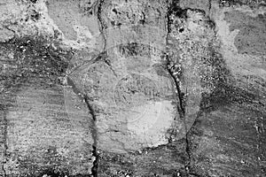 Close-up of White cement crack wall and peeled paint caused by water and sunlight. Peel wall of White house paint with black stain