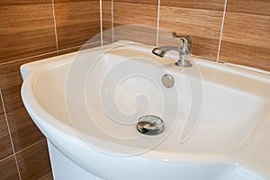 White ceramic wash basin for face and hand in bathroom