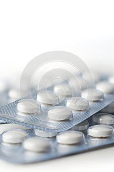 close-up of white color tablets in blister pack