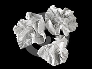 Close-up white crumpled paper or napkins on black background. View from above