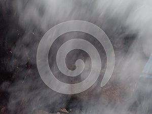 Close-up of white fog or stream.