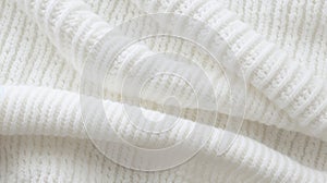 A close up of a white knit fabric