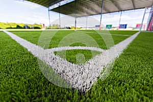 Close up White line corner on a soccer field grass