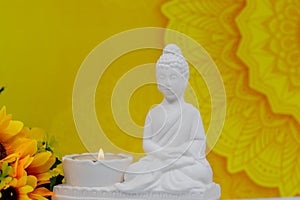 Close up of white marble figurine of Siddhartha Gautama, known as Buddha