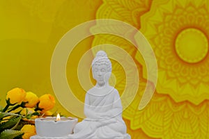 Close up of white marble figurine of Siddhartha Gautama, known as Buddha