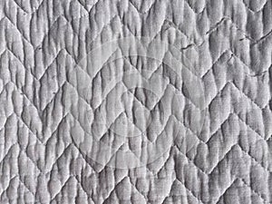 Close up of white mattress texture.