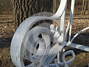 Close up white metal bench