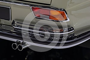 The close up of white oldtimer rear brake light. photo