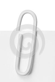 Close up of a white paper clip