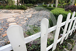 Close up White picket fence in the beautyful park in Hong Kong