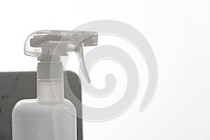 Close up white plastic foggy spray bottle head.