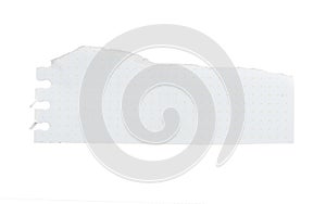 close up of a white ripped piece of paper with copyspace. torn paper isolated on white background with clipping path