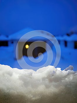 Close up white snow at the windows, White snowflakes at the windows under blue sky, Seasons greetings, merry Christmas,