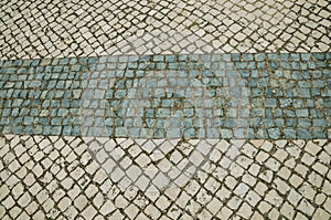 Close-up of white stone pavement in square shape