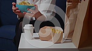 Close up of white table with fast food takeaway meal