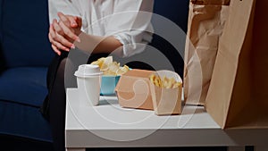 Close up of white table with fast food takeaway meal