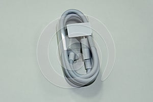 Close up white USB cable plug on white background