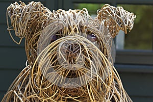Close up of wicker made dogs head