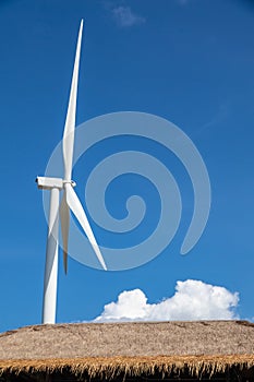 Close up wind turbine eco power with blue sky background