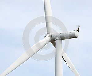 Close up wind turbine generating electricity producing alternative energy