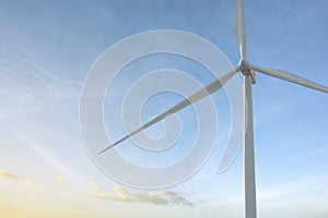 Close-up wind turbine in rotation to generate electricity energy on outdoor with  blue sky background, Conservation and